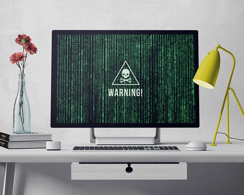 Computer screen with alert icon on it