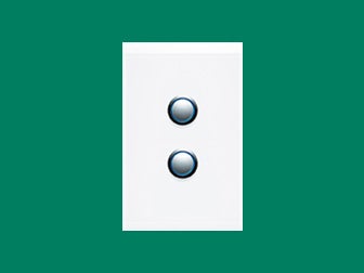 Light switch on a green background