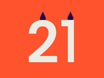 A stylised number 21 with candles coming out of the 2 and the 1
