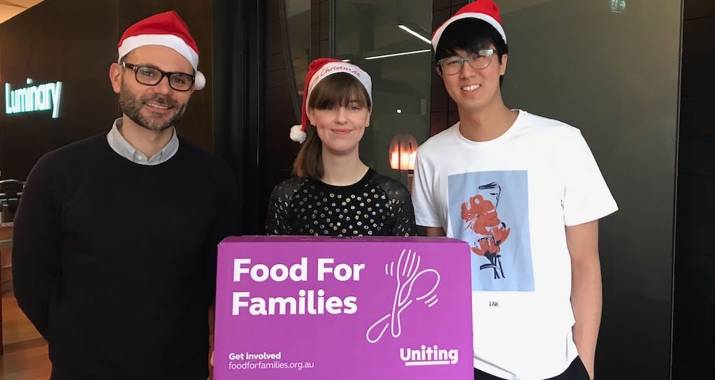 Kim, Kate and Franky with a Food for Families box